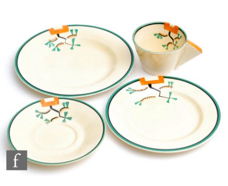A Clarice Cliff Conical cup, saucer and side plate circa 1932, hand painted in the Ravel pattern with an abstract motif to th