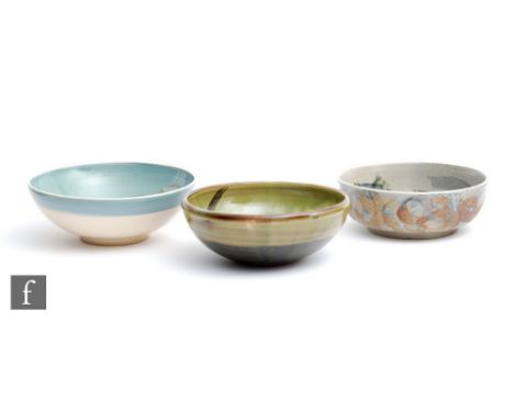 A Winchcombe studio pottery bowl decorated in a green glaze with a brown wiggled line, impressed mark, diameter 20cm, togethe