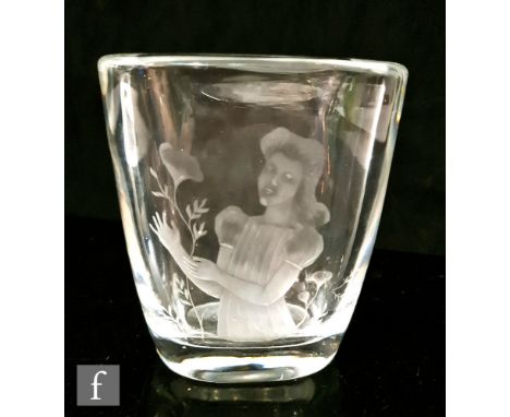 A post war Orrefors clear crystal glass vase of rounded square section, engraved with a stylised female in a flowing gown hol