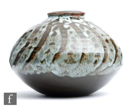 A later 20th Century David Leach studio pottery vase of compressed form decorated with a wax resist wrythen and dot pattern t