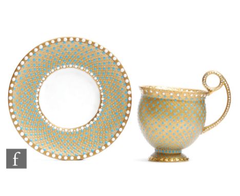 A small contemporary coffee cup and saucer decorated by former Royal Worcester gilder Ken Russell, the gilt ground with blue 