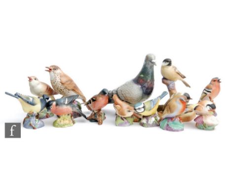 A Beswick pigeon, model 1383, together with two Beswick birds and nine Royal Worcester birds, all with printed marks. (12) 