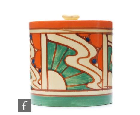 A Clarice Cliff drum shaped preserve pot circa 1930, hand painted in the Sunrise Orange pattern with panels of sunburst motif