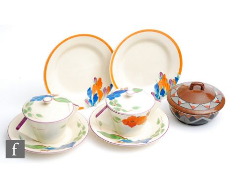 A pair of Clarice Cliff Crocus pattern plates circa 1930, each hand painted to the shoulder with sprays of flowers with an or