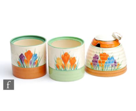 A Clarice Cliff large size Bee Hive honey pot in the Crocus pattern with hand painted crocus sprays, together with a Drum pre