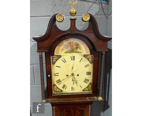 A 19th Century mahogany longcase clock painted arch dial by Jas Rough Kilcaid, enclosed by a beaded pillared door and broken 