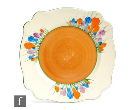 A large Clarice Cliff Leda shape plate circa 1929, hand painted in the Crocus pattern with sprays of crocus with green and br