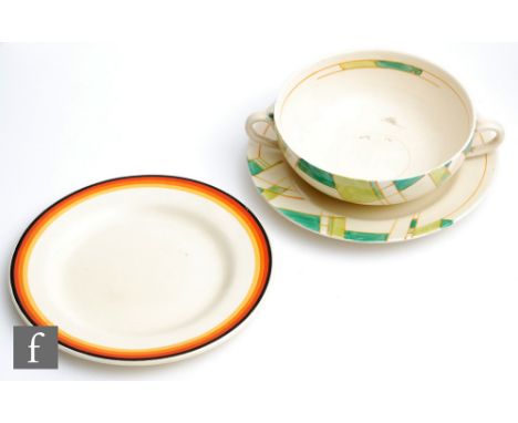 A Clarice Cliff twin handled soup bowl and stand circa 1932, hand painted in the Tartan Green pattern with an abstract linear