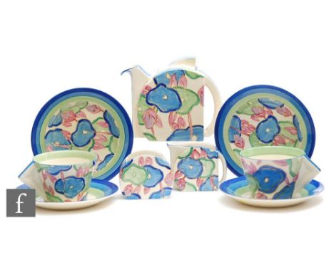 A Clarice Cliff Stamford shape early morning breakfast tea service circa 1932, comprising teapot, milk, sugar, two cups, sauc