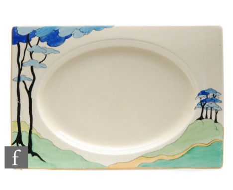 A Clarice Cliff Biarritz serving platter circa 1934, hand painted in the Blue Firs pattern with a stylised tree lined landsca