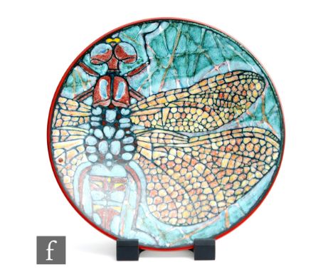 A later 20th Century Poole Pottery studio charger designed by Tony Morris and decorated with a close-up detail of a dragonfly
