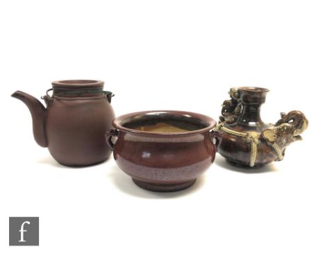 A collection of Chinese ceramics, to include a copper-red censer, height 9.5cm, a Yixing teapot, height 14cm, and a treacle g