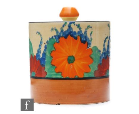 A Clarice Cliff drum shaped preserve pot and cover circa 1930, hand painted in the Gay Day pattern with a band of stylised fl