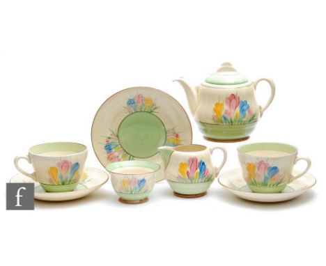 A Clarice Cliff Windsor shape early morning breakfast set circa 1940, comprising teapot, milk, sugar, two cups, saucers and a