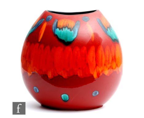 A later 20th Century Poole Pottery Living Glaze pillow vase decorated with abstract patterns over the red ground, likely to a