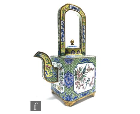 A Chinese Canton enamel teapot, late Qing Dynasty (1644-1912), decorated in the Qianlong style, with green and yellow ground,