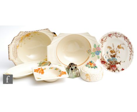 A small collection of Clarice Cliff table wares to include two large Daffodil serving bowls, a Dolly Cliff&nbsp; Bizarritz de