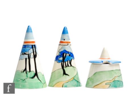 A Clarice Cliff Conical cruet set circa 1932, hand painted in the Blue Firs pattern with a stylised tree lined coastal landsc