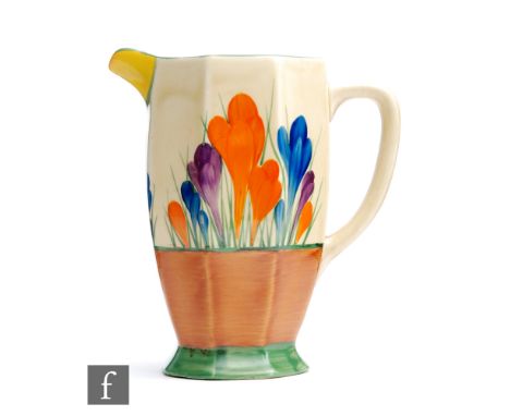 A Clarice Cliff Athens shape jug circa 1930, hand painted in the Crocus pattern with sprays of crocus flowers with green, yel