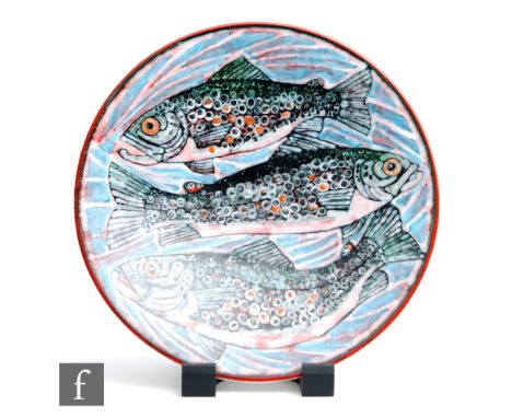 A later 20th Century Poole Pottery studio charger designed by Tony Morris and decorated with three salmon against a tonal blu