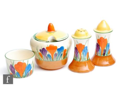 A Clarice Cliff preserve pot and cover circa 1930, hand painted in the Crocus pattern with crocus sprays between orange, yell