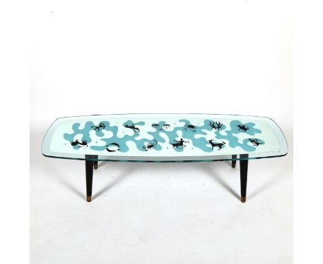 A Mid-Century glass mirror top Zodiac design coffee table, top 121 x 43cm, height 33cmOne minor chip to edge, sign of light w