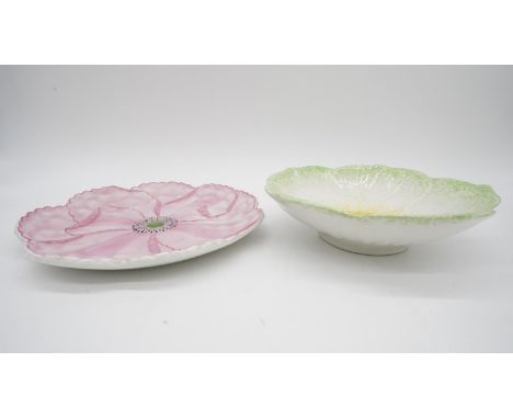 Two painted Portuguese ceramic flower plates. Makers stamp to base of one. H.7 W.24 D.24 