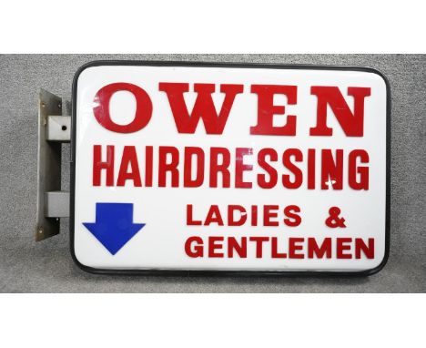 A vintage wall mounted light up advertising sign for Owen Hairdressing. (Bulbs missing) H.68 W.106 D.15cm 