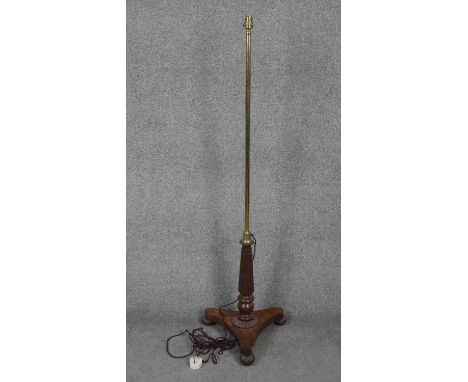 A standard lamp converted from a Regency mahogany occasional table base. H.134cm 