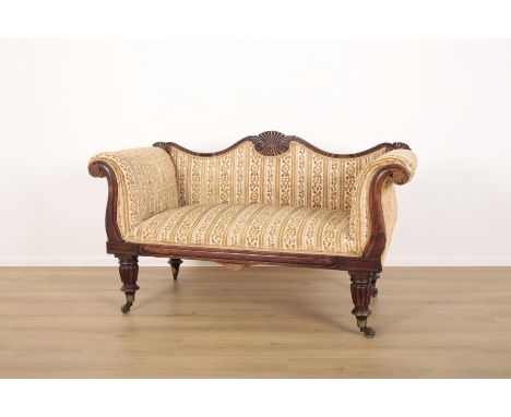 A VICTORIAN HIGH BACK TWO SEATER SOFAlate-19th century, the arched mahogany seat rail with scallop shell motifs, and high scr