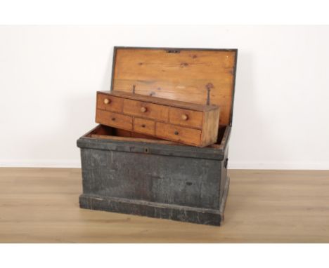 A VICTORIAN BLACK-PAINTED WOODEN SHIPWRIGHT'S OR ARTISAN'S TRUNKwith internal raised bank of six drawers and partitions for t