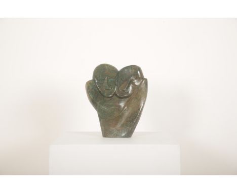 20TH CENTURY ZIMBABWEAN 'Twin Faces'carved dark green serpentine stone, 32cm high x 27cm wide x 8cm deep