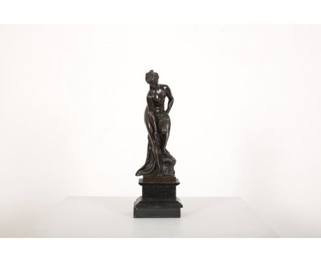 A BRONZE FIGURE OF 'VENUS AU BAIN' AFTER CHRISTOPHE-GABRIEL ALLEGRAIN (1710-1795)signed on the rocky outcrop and raised on sq