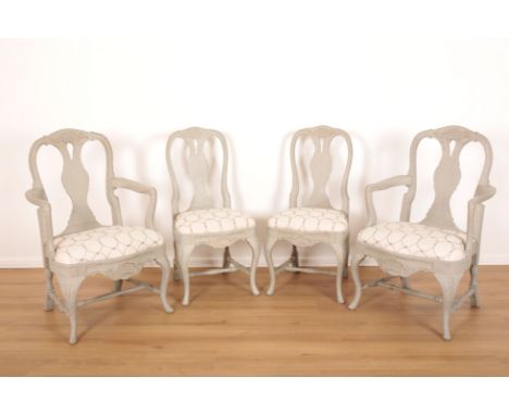 FOUR GREY PAINTED DINING CHAIRS IN THE GUSTAVIAN STYLEcomprising two carvers and two dining chairs, all with pierced vase-sha