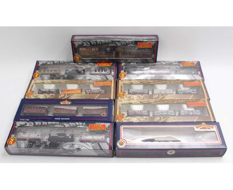 One tray containing eight Bachmann 00 gauge wagon triple packs, together with a Bachmann 45-ton bogie well wagon. Triple pack