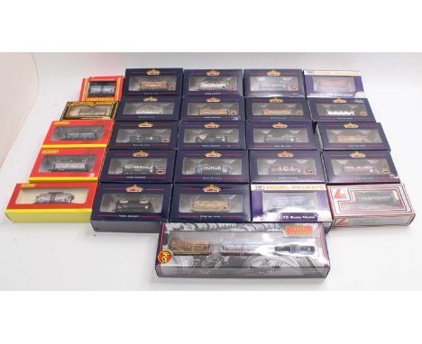 One tray containing 00 gauge petrol and milk tankers, by various manufacturers, including Bachmann, Hornby, Dapol, and others