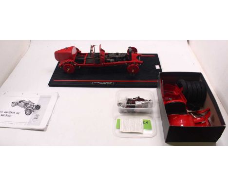 Pocher 1/8th scale partial build kit of an Alfa Romeo 8C 2300 Monza 1931, without a box but with a wooden plinth with instruc