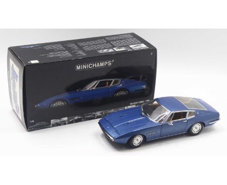 Minichamps 1/18 scale modern issue diecast model of a Maserati Ghibli 1969 in a metallic blue body, housed in a polystyrene p