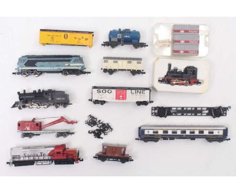 A small collection of continental and American N gauge to include a Lima Wagon Lit Pullman, a Pennsylvania 2-6-4 tank engine,