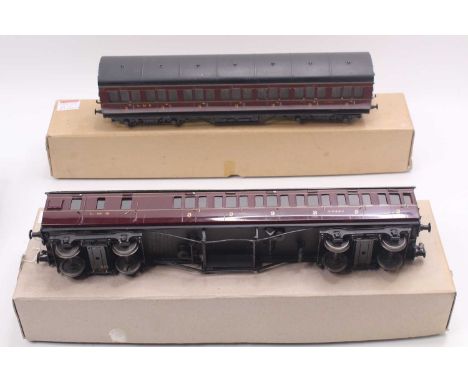 Two Exley 0 gauge coaches including an all-third, in LMS maroon, has been partially repainted, fitted with semi-coarse scale 