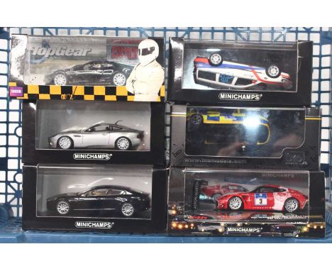 Six Minichamps 1:43 scale modern issue diecast models to include an Aston Martin Raptide, in black an Aston Martin Vanquish S