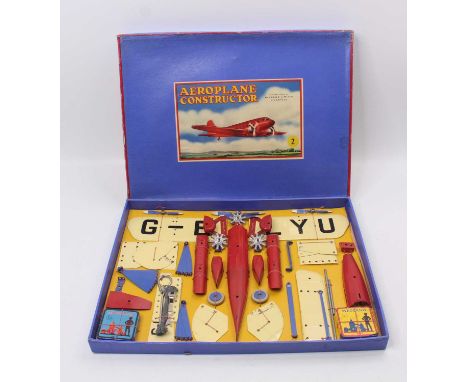 Meccano No.2 Aeroplane Constructor, c1936, red and cream example with Civilian markings, re-strung on backing card with instr