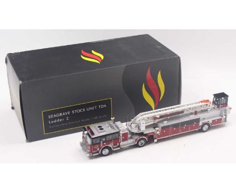 A TWH Collectibles No. TWH094A 1/50 scale diecast model of a Seagrave Stock Unit TDA Ladder 2 fire engine, housed in the orig