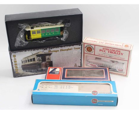 Four HO gauge locos to include a Lima 2-car tram, fitted with N gauge couplings, an Airfix American 4-4-0 central pacific rai