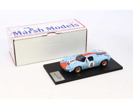 A Marsh Models No. MM250 1/43 scale factory hand built model of a Mirage M1 Spa 1967 race car, comprising light blue and oran