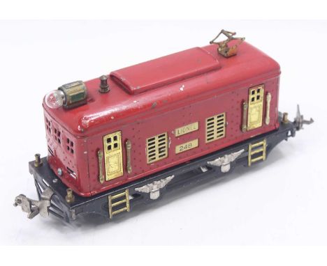 Lionel 0-gauge 0-4-0 electric outline loco No.248, red. Noticeable chips and brush marks suggest a long-ago repaint.