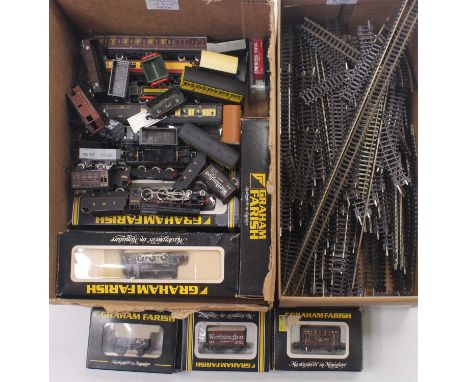 Selection of N-gauge locos, coaches &amp; wagons. Mostly Graham Farish. Locos – J94; Black 5 &amp; 4F. Eight bogie coaches in