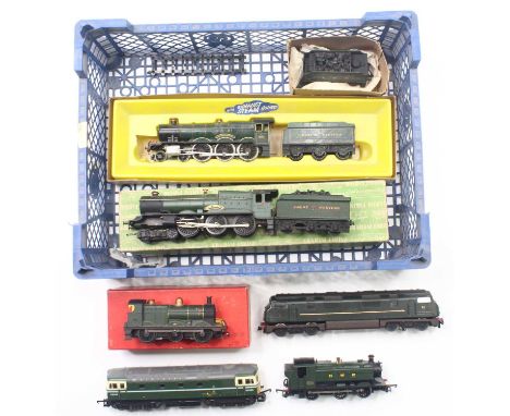 Seven 00 gauge locos to include a Graham Farish King class in GWR unlined green, an unboxed Lima 94xx, in unlined GWR green, 
