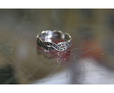 A silver and marcasite ring.