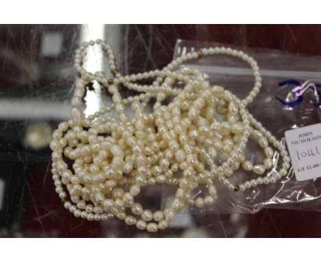 Pearl necklaces.